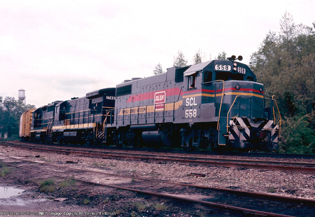 Seaboard Coast Line GP38-2 #558 leads 329's extra south by the former site of the depot 